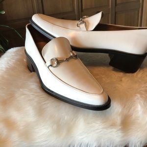 Men’s white leather Gucci loafers
